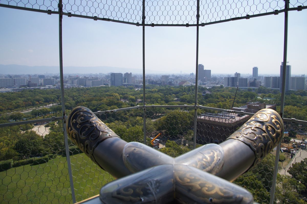 DSC09455 2 View across Osaka from behind the observation deck safety fence