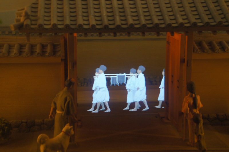 DSC09478 2 Illuminated historical figures projected onto a castle gate display inside Osaka Castle