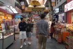 Gary walking through Kuromon Market