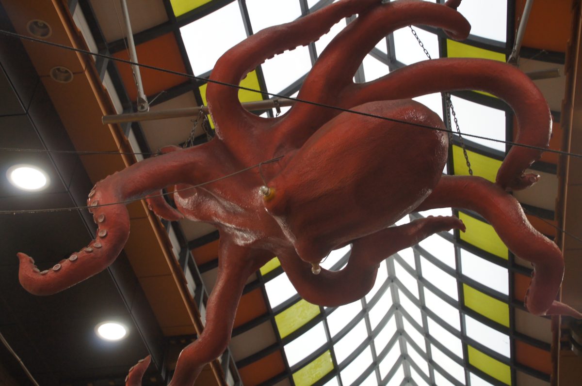 Giant octopus sculpture hanging inside Kuromon Ichiba Market