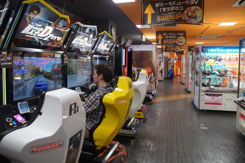 DSC09803 2 Gary playing a driving arcade game in Den Den Town, Osaka