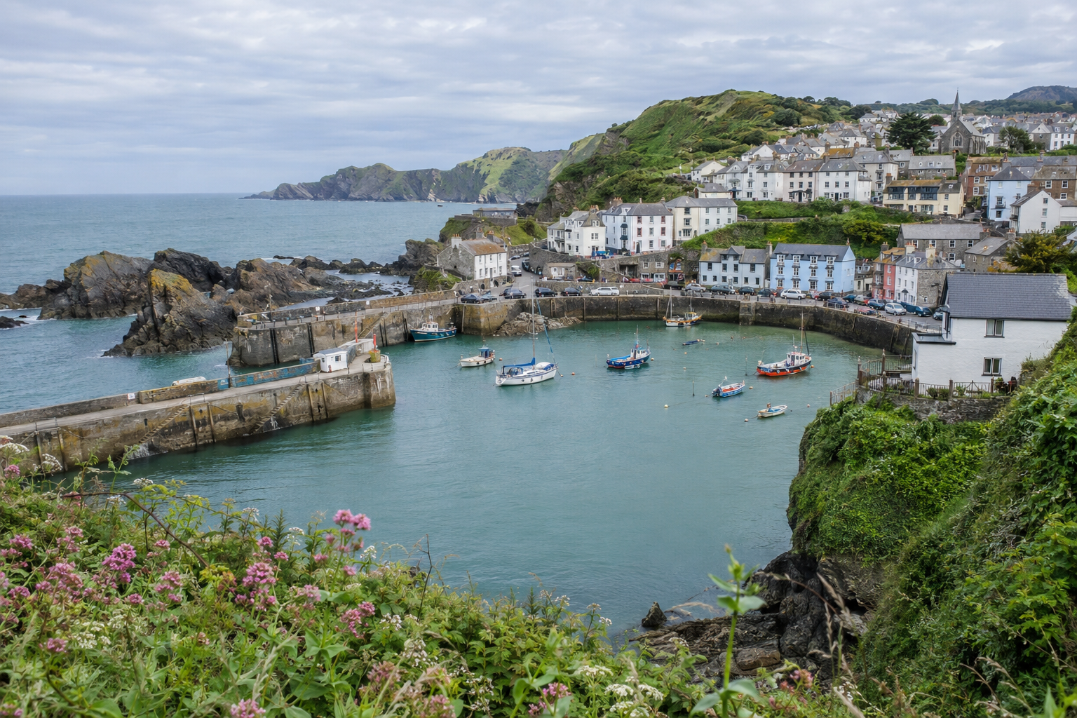 Ilfracombe harbour, boats and hillside buildings on the North Devon coast