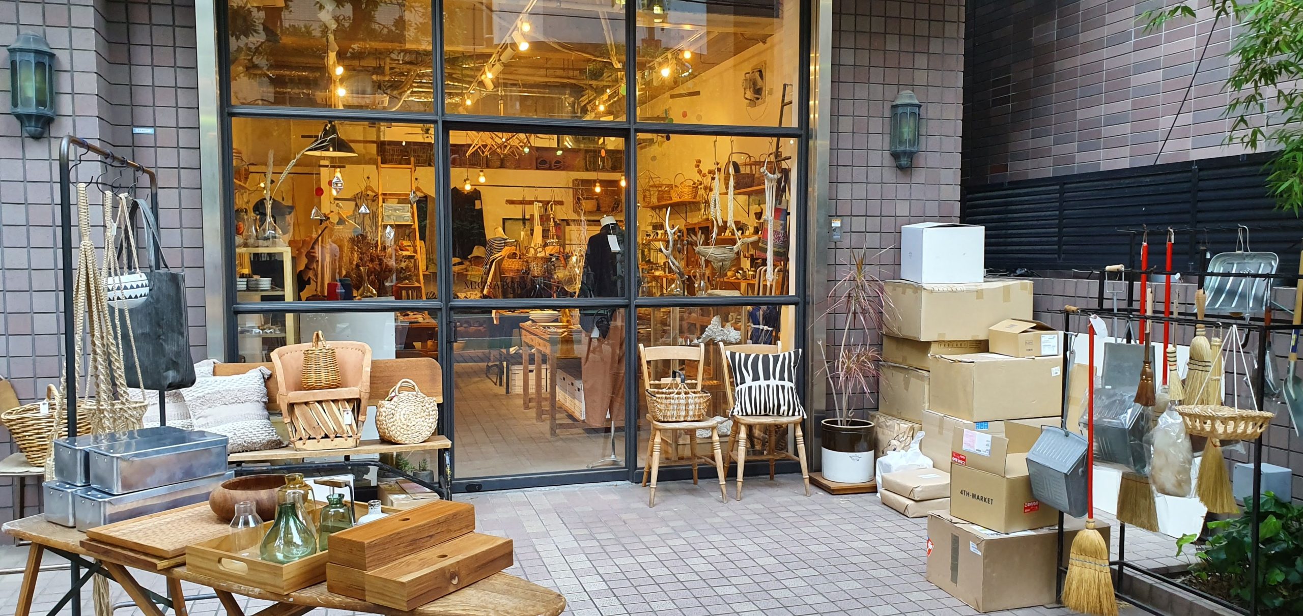 Nakameguro 20 scaled Chairs, baskets and vintage furniture outside a Nakameguro shop