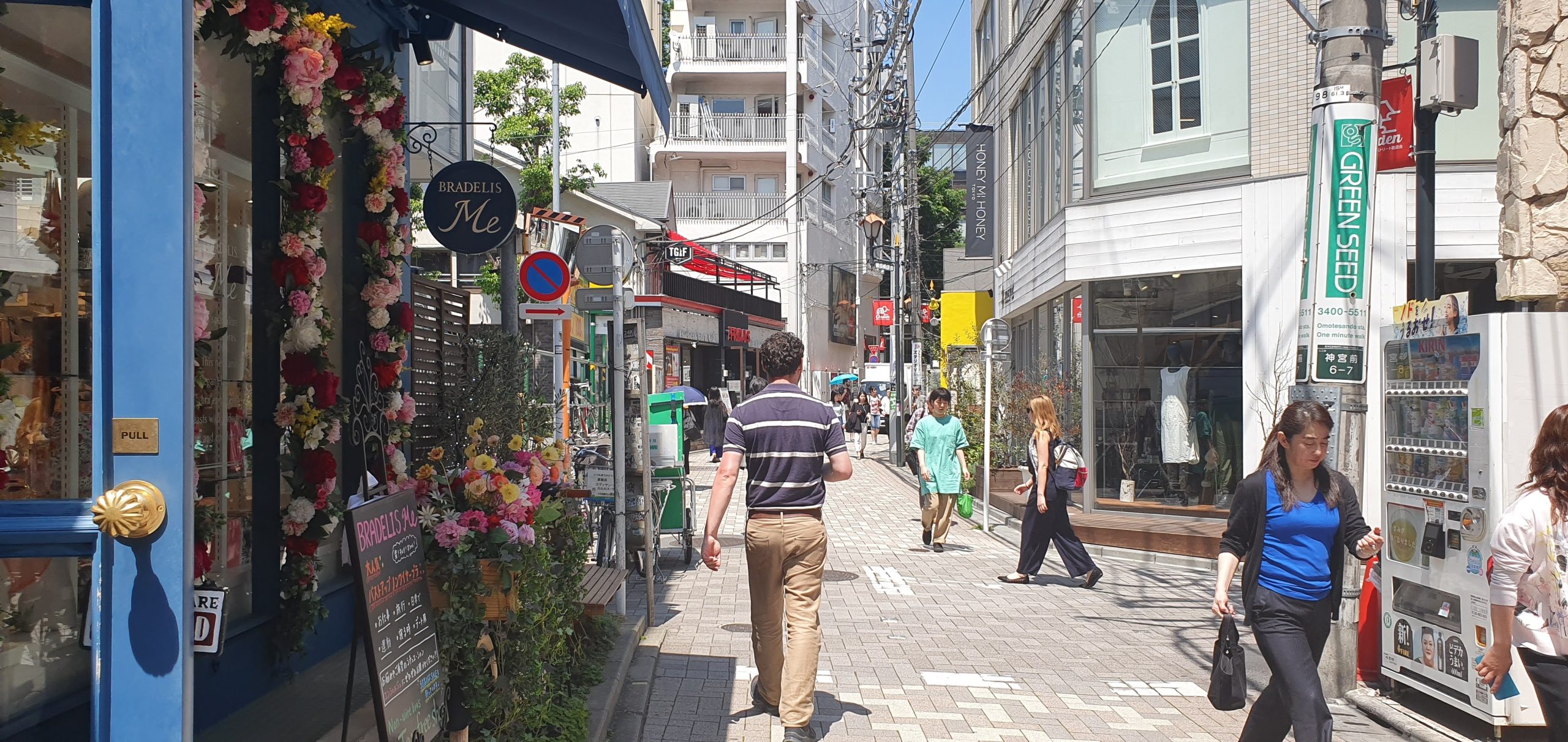 Shibuya 1 scaled Gary walking along a Harajuku side street lined with small shops