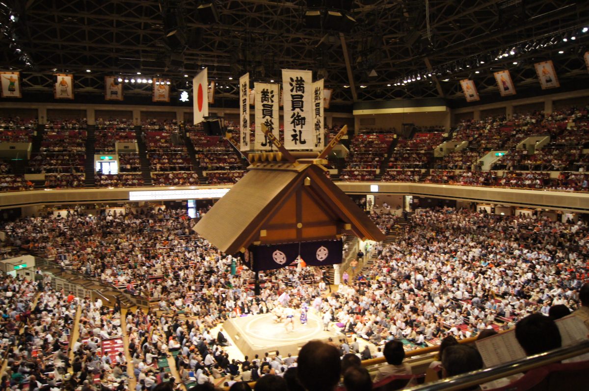 Sumo Tournament 1 The ring and hanging roof inside Ryogoku Kokugikan during a sumo tournament