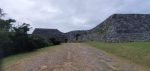 Arched gateway in the stone walls of Zakimi Castle ruins
