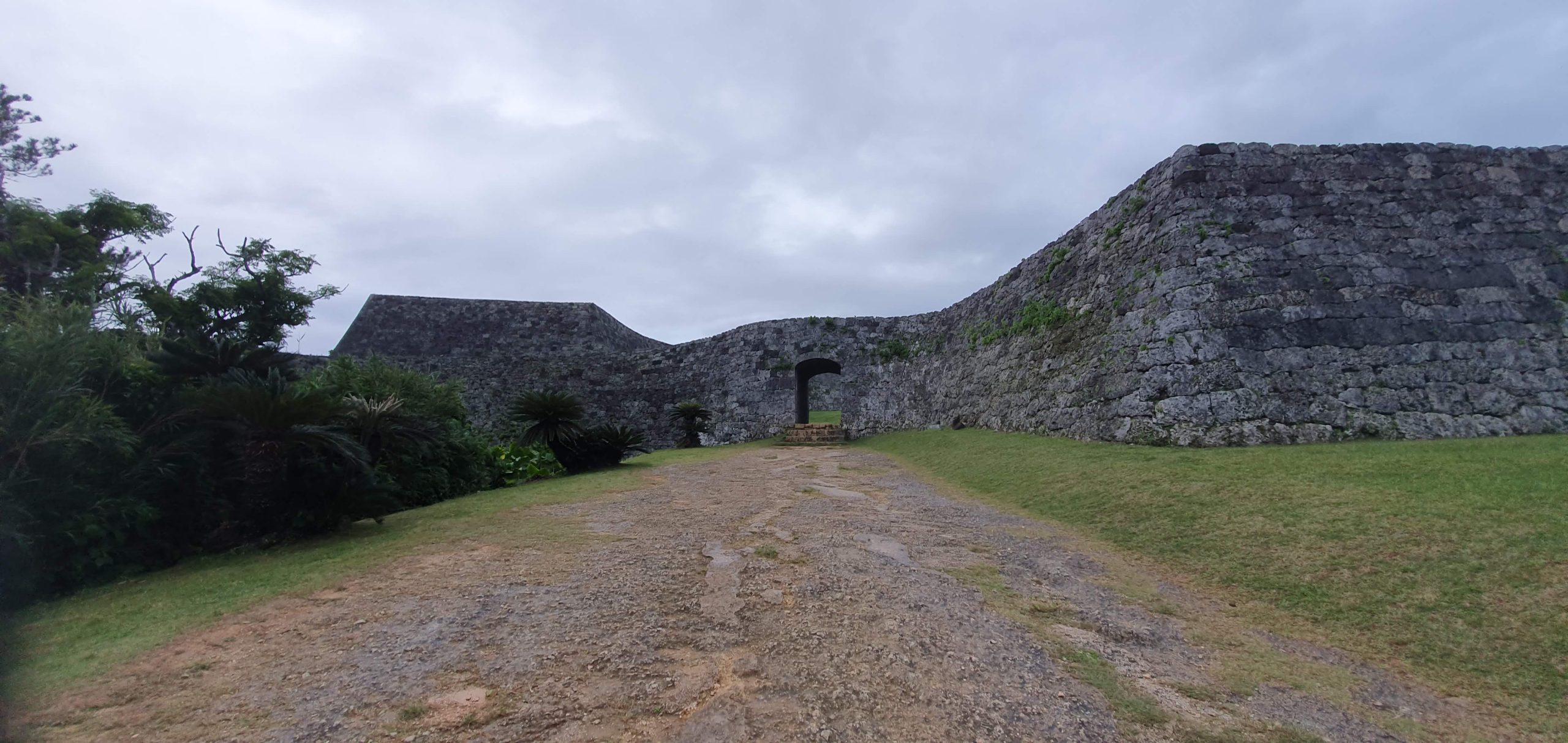 Zakimi Castle gateway scaled Arched gateway in the stone walls of Zakimi Castle ruins