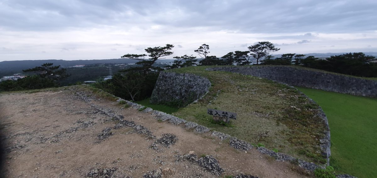 Zakimi Castle walls and view Curving stone walls and the surrounding landscape at Zakimi Castle