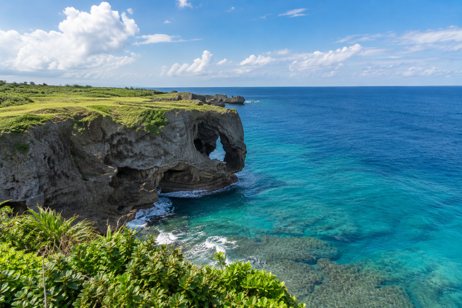 Cape Manzamo’s coastal rock formation above turquoise water in Okinawa