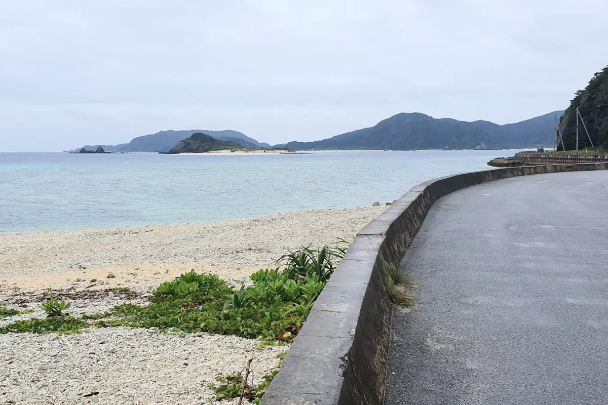 Coastal road beside the sea on the walk to Ama Beach