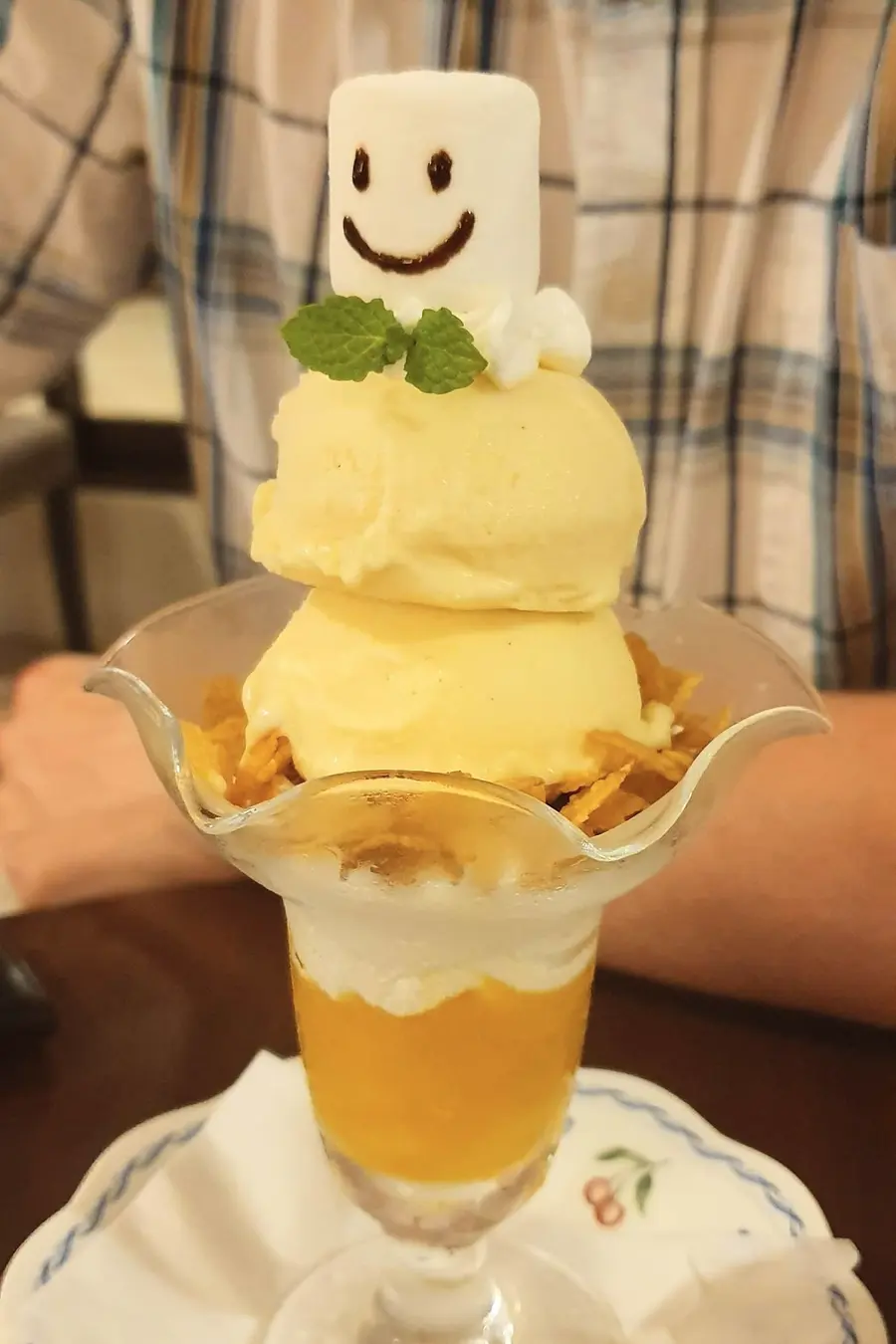 Ice cream dessert topped with a smiling marshmallow at Grandvrio Resort Ishigakijima