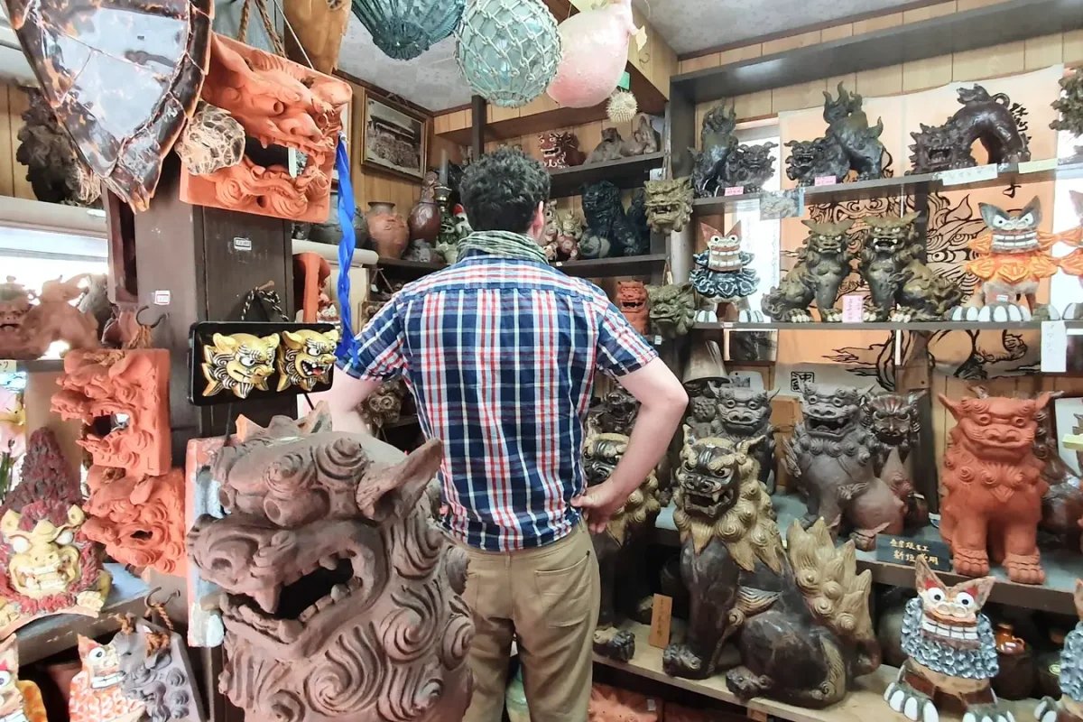 okinawa gary browsing pottery in tsuboya 11379 Gary browsing a pottery shop on Tsuboya Yachimun Street