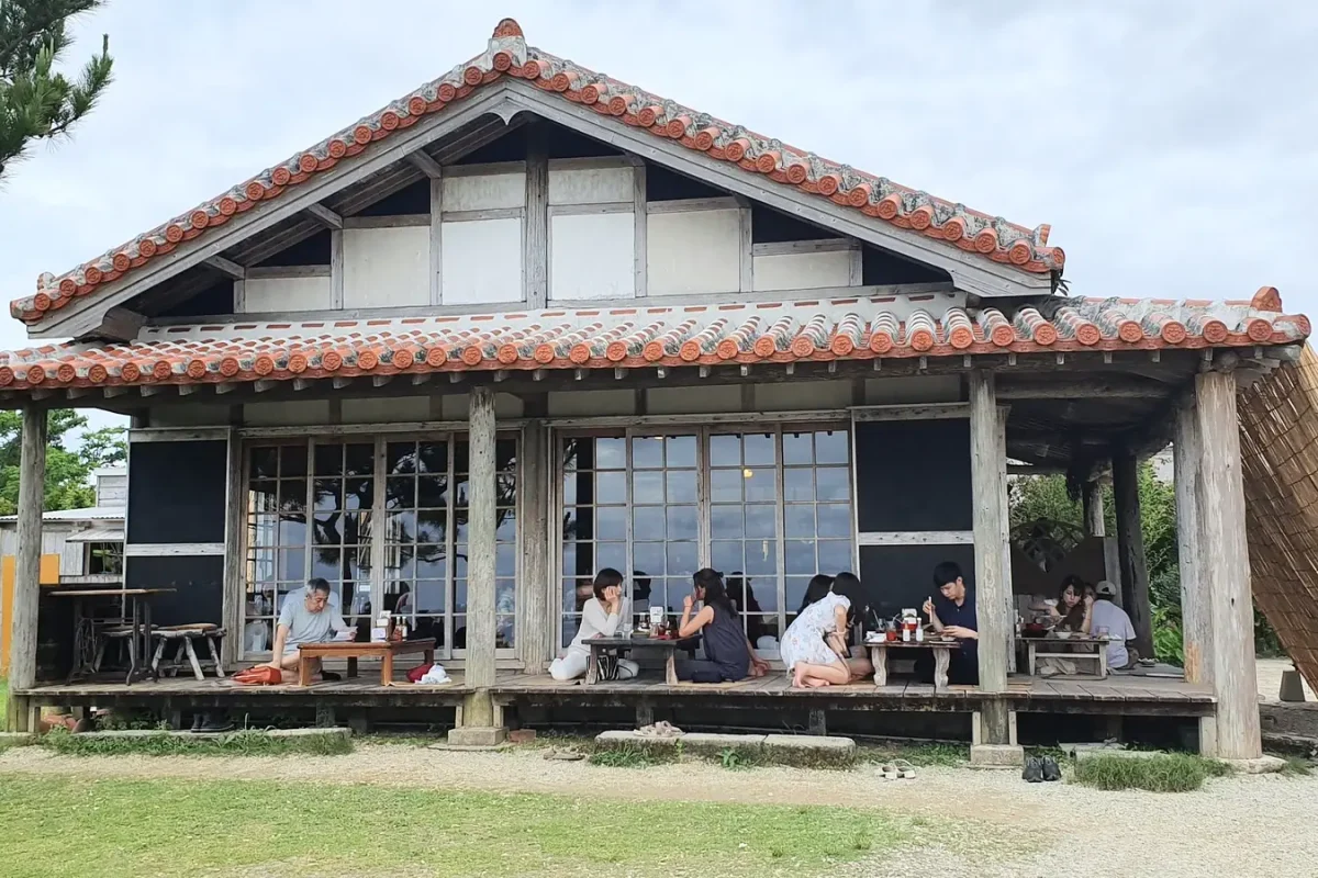 Traditional building housing Pizza in the Sky restaurant in Motobu