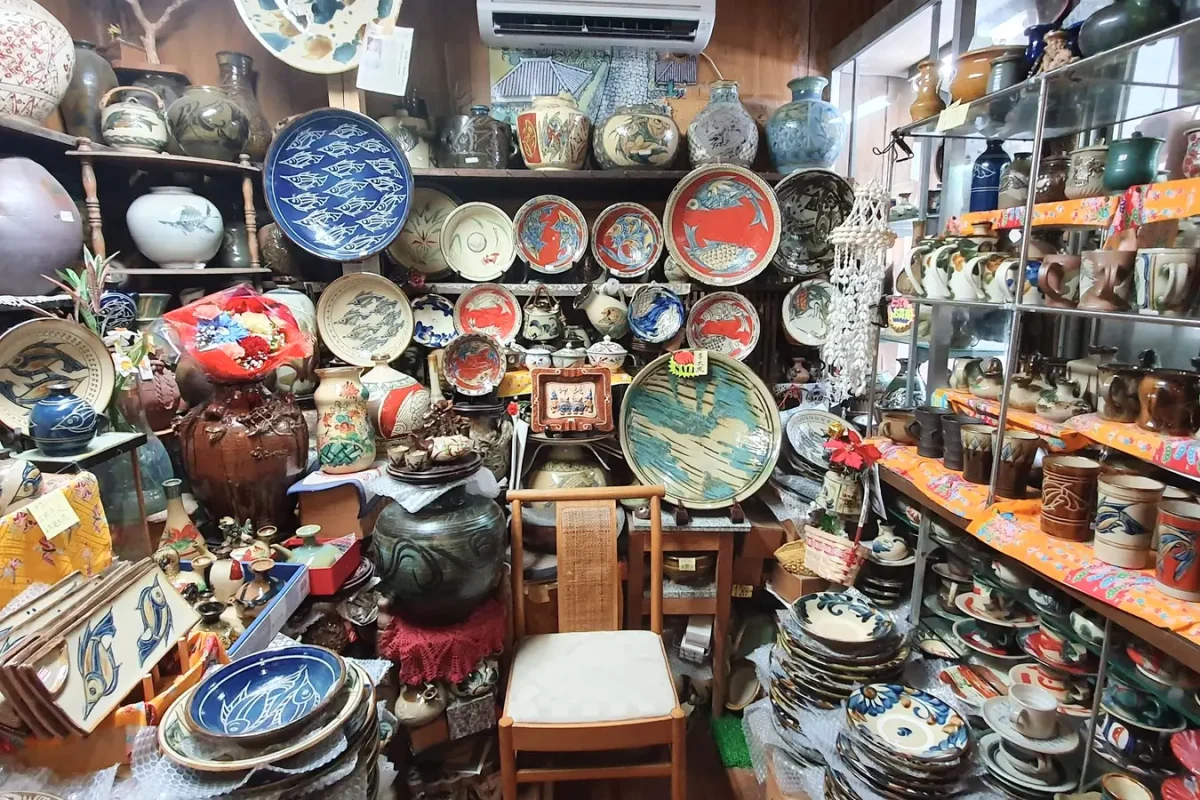 okinawa pottery shelves on tsuboya yachimun street 11380 Shelves filled with pottery in a shop on Tsuboya Yachimun Street
