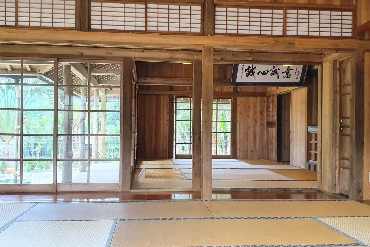Wooden interior and tatami rooms inside a traditional house at Ryukyu Mura