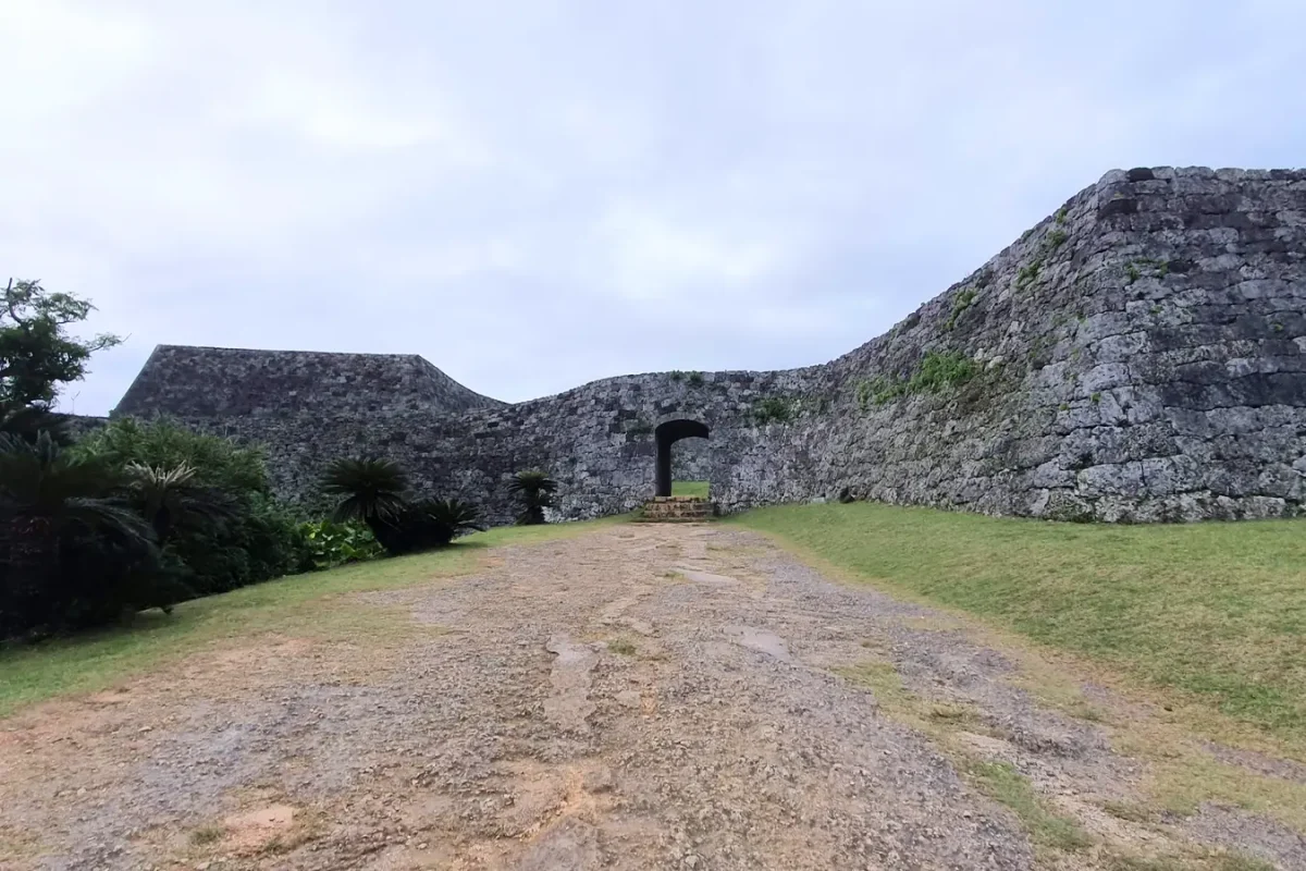 Arched gateway in the stone walls of Zakimi Castle ruins