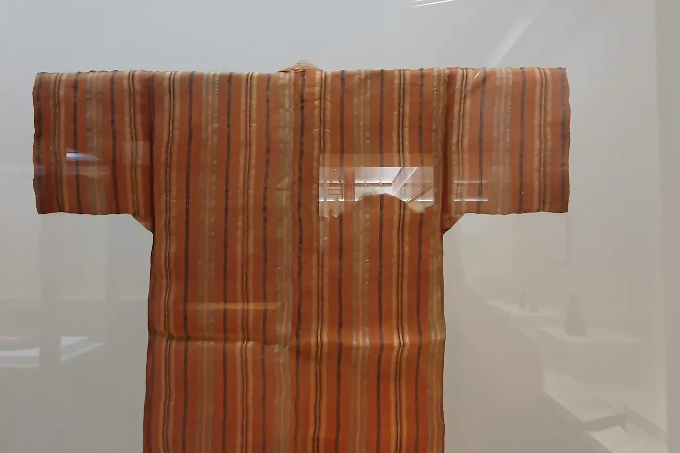 uf a0716ac7e47a416a Striped traditional garment displayed at Okinawa Prefectural Museum